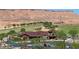 Stunning community clubhouse surrounded by a scenic golf course and desert landscape, perfect for social gatherings at 950 Overland Trl, Mesquite, NV 89034