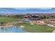 Picturesque community golf course with a lake, sand traps and lush green fairways, providing a challenging game at 950 Overland Trl, Mesquite, NV 89034