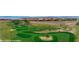 Scenic view of the community putting green, showcasing well-maintained greens and beautiful landscaping at 950 Overland Trl, Mesquite, NV 89034