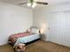 Bedroom featuring neutral carpet, a ceiling fan, and slider closet at 9746 Brooks Lake Ave, Las Vegas, NV 89148