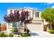 Charming two-story home featuring a landscaped yard and a two-car garage at 9746 Brooks Lake Ave, Las Vegas, NV 89148