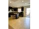 Charming kitchen featuring stainless steel appliances, granite countertops, and a center island at 9746 Brooks Lake Ave, Las Vegas, NV 89148