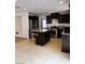 Charming kitchen featuring stainless steel appliances, granite countertops, and a center island at 9746 Brooks Lake Ave, Las Vegas, NV 89148
