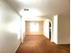 Bright living room with arched doorway and neutral decor, ready for personal touches at 9746 Brooks Lake Ave, Las Vegas, NV 89148