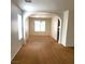 Spacious living room with an arched doorway and lots of light at 9746 Brooks Lake Ave, Las Vegas, NV 89148