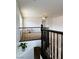 View of open, bright upstairs loft area with railing at 9746 Brooks Lake Ave, Las Vegas, NV 89148