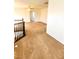 Upstairs loft leading to another room, carpet flooring at 9746 Brooks Lake Ave, Las Vegas, NV 89148