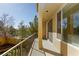 This balcony features a great view, a neutral color palette, and a sliding glass door at 1009 Ancient Timber Ave, Henderson, NV 89052