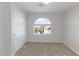 Bedroom with a large window and closet at 1009 Ancient Timber Ave, Henderson, NV 89052