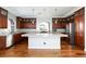 Large kitchen featuring granite countertops, stainless steel appliances, and custom cabinetry at 1009 Ancient Timber Ave, Henderson, NV 89052