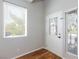 Bright sun room with hardwood floors, natural light and views of the outdoors at 1009 Ancient Timber Ave, Henderson, NV 89052