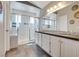 Bathroom featuring double sinks, lots of counterspace, and a glass walk-in shower at 10216 Via Roma Pl, Las Vegas, NV 89144