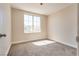 Cozy bedroom with a window filling the space with natural light at 10216 Via Roma Pl, Las Vegas, NV 89144