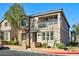 Charming two-story home with a mix of stone and stucco facade and a small front yard at 11023 Mount George St, Las Vegas, NV 89179