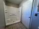 Modern bathroom featuring a tiled shower and tiled floors offer a clean aesthetic at 1132 S 10Th St, Las Vegas, NV 89104