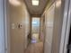 Hallway with tile flooring, built-in storage, and access to the bathroom at 1132 S 10Th St, Las Vegas, NV 89104