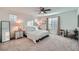 Spacious bedroom with carpet flooring, and natural light from large windows with blinds at 1328 Graphite Ave, Henderson, NV 89002