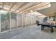 Covered back patio with ping pong table and grill at 2204 Plaza De La Candela, Las Vegas, NV 89102