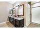 Bathroom with double sinks and walk in shower at 2673 Red Rock St # 102, Las Vegas, NV 89146