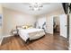 Bright bedroom with a ceiling fan, and walk in closet at 2673 Red Rock St # 102, Las Vegas, NV 89146