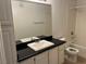 Functional bathroom with a single sink vanity, a large mirror, and a shower-tub combination at 2900 Sunridge Heights Pkwy # 327, Henderson, NV 89052