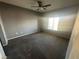 Bedroom featuring neutral walls, carpet, and a window with natural light at 3920 Legend Hills St # 204, Las Vegas, NV 89129