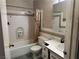 Bathroom features a tiled shower-tub combination with a single sink vanity at 3946 Voxna St, Las Vegas, NV 89119