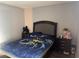 Cozy bedroom with natural light and comfortable furnishings at 3946 Voxna St, Las Vegas, NV 89119