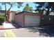 A detached one car garage featuring a block wall and concrete driveway at 3946 Voxna St, Las Vegas, NV 89119