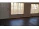 Open living room with new vinyl floors and lots of natural light at 3946 Voxna St, Las Vegas, NV 89119