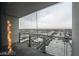 Spacious balcony with expansive city views through a seamless glass railing at 4381 W Flamingo Rd # 2405, Las Vegas, NV 89103