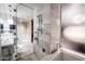 Modern bathroom with glass shower, tub, and sleek, upscale finishes at 4381 W Flamingo Rd # 2405, Las Vegas, NV 89103