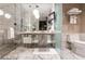 Luxurious bathroom with marble accents, modern toilet, and floating vanity at 4381 W Flamingo Rd # 2405, Las Vegas, NV 89103