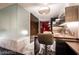 Contemporary kitchen area with stainless steel appliances, marble flooring, and comfortable seating at 4381 W Flamingo Rd # 2405, Las Vegas, NV 89103