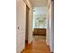 A glimpse of the bathroom reveals a double vanity, tile flooring and sliding closet doors at 4520 Lemon Gems Ct, Las Vegas, NV 89130