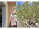 This balcony features seating and beautiful views of the surrounding area, creating a peaceful retreat at 5000 Red Rock St # 241, Las Vegas, NV 89118