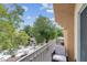 Private balcony overlooking lush landscaping and a serene water feature at 5000 Red Rock St # 241, Las Vegas, NV 89118