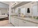 Bathroom with double sinks, granite countertop, and shower at 5000 Red Rock St # 241, Las Vegas, NV 89118