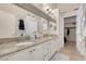 Bathroom with double sinks, granite countertop, and separate shower at 5000 Red Rock St # 241, Las Vegas, NV 89118