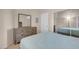 Bedroom featuring a bed, chest and a full size mirror at 5000 Red Rock St # 241, Las Vegas, NV 89118