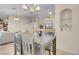 Cozy dining area featuring a chandelier and convenient access to kitchen and living spaces at 5000 Red Rock St # 241, Las Vegas, NV 89118
