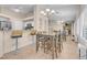 Well-lit dining area with counter seating, adjacent to kitchen and overlooking living room, ideal for entertaining at 5000 Red Rock St # 241, Las Vegas, NV 89118