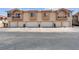Well-maintained townhome with private balconies, garage parking, and desert landscaping at 5000 Red Rock St # 241, Las Vegas, NV 89118