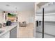 Seamless flow from kitchen to living area, featuring stainless steel refrigerator at 5000 Red Rock St # 241, Las Vegas, NV 89118