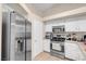 Kitchen featuring stainless steel appliances and ample cabinet space at 5000 Red Rock St # 241, Las Vegas, NV 89118