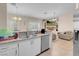 Granite countertops and stainless steel dishwasher enhance the modern kitchen space at 5000 Red Rock St # 241, Las Vegas, NV 89118