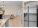 Open kitchen concept showcasing stainless refrigerator with easy access to adjacent living area at 5000 Red Rock St # 241, Las Vegas, NV 89118