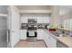 Efficient kitchen with stainless appliances and granite countertops for a modern look at 5000 Red Rock St # 241, Las Vegas, NV 89118