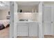 Convenient laundry closet with a stacked washer and dryer unit for easy laundry access at 5000 Red Rock St # 241, Las Vegas, NV 89118