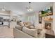 Inviting living space featuring fireplace, plush seating, and open layout to the kitchen at 5000 Red Rock St # 241, Las Vegas, NV 89118